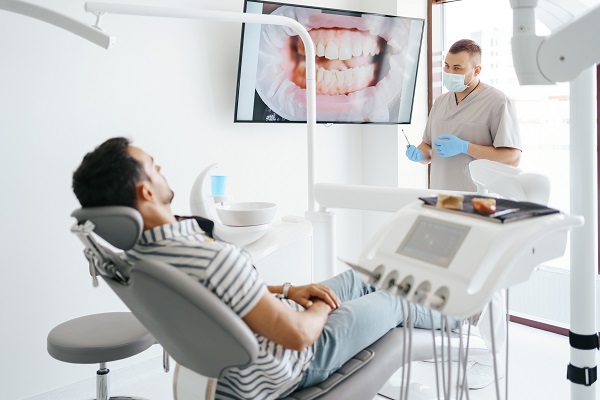 dentist discussing procedure with patient